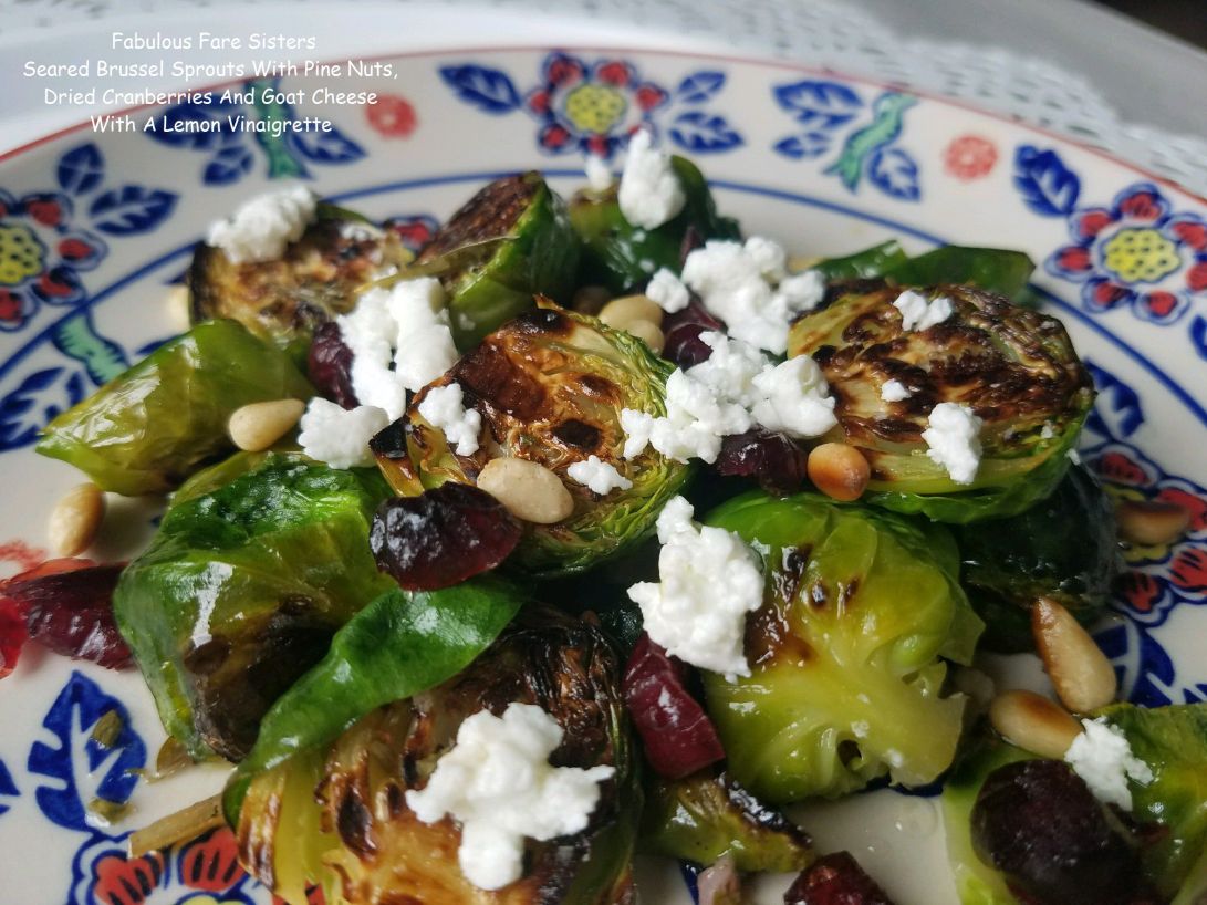 Seared Brussel Sprouts With Pine Nuts, Dried Cranberries And Goat Cheese With A Lemon Vinaigrette